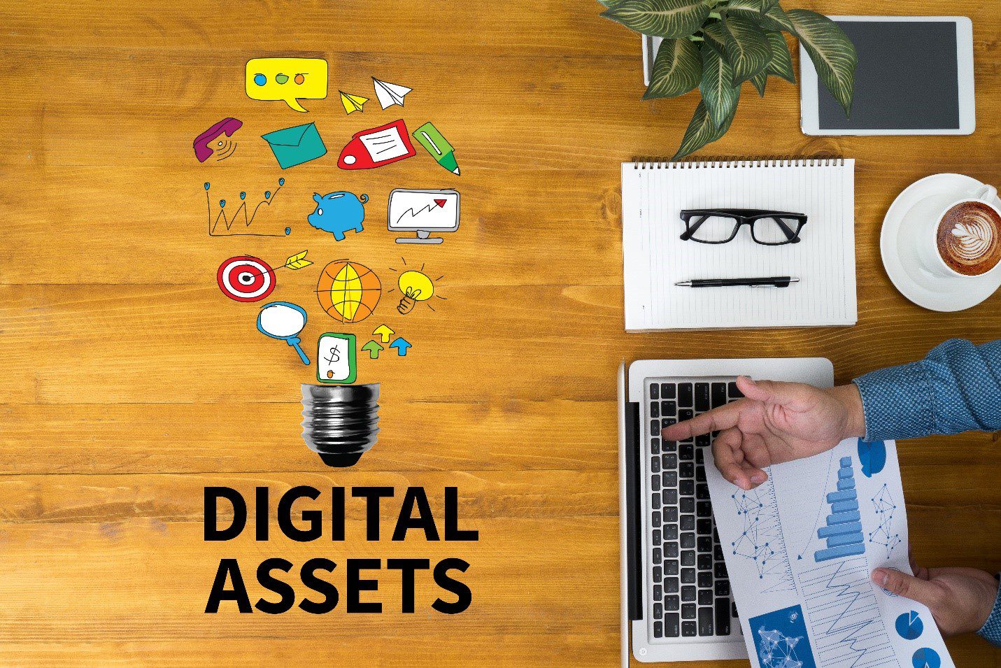 digital assets on wooden table