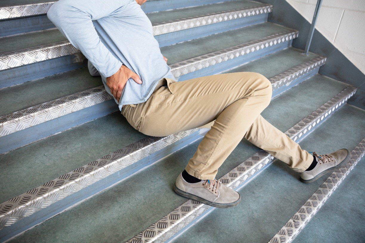 man after falling on steps