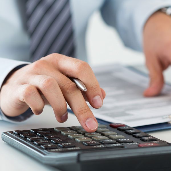 businessman calculating finances